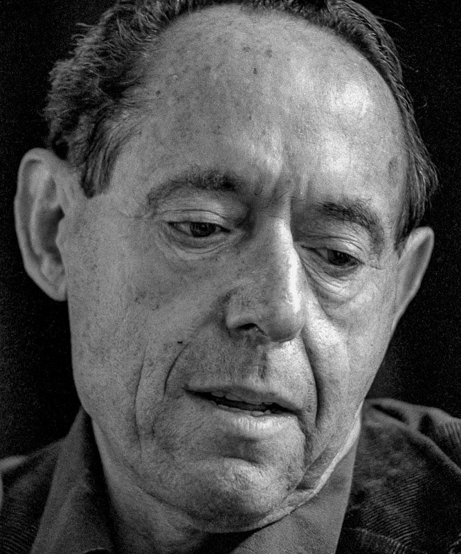 Al Richmond portrait looking thoughtful.